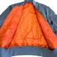 Repaired Military MA-1 Style Jacket Silver Nylon Reversible Orange lining [0012]