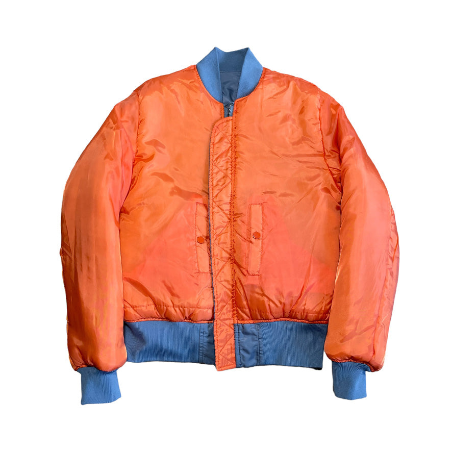 Repaired Military MA-1 Style Jacket Silver Nylon Reversible Orange lining [0012]