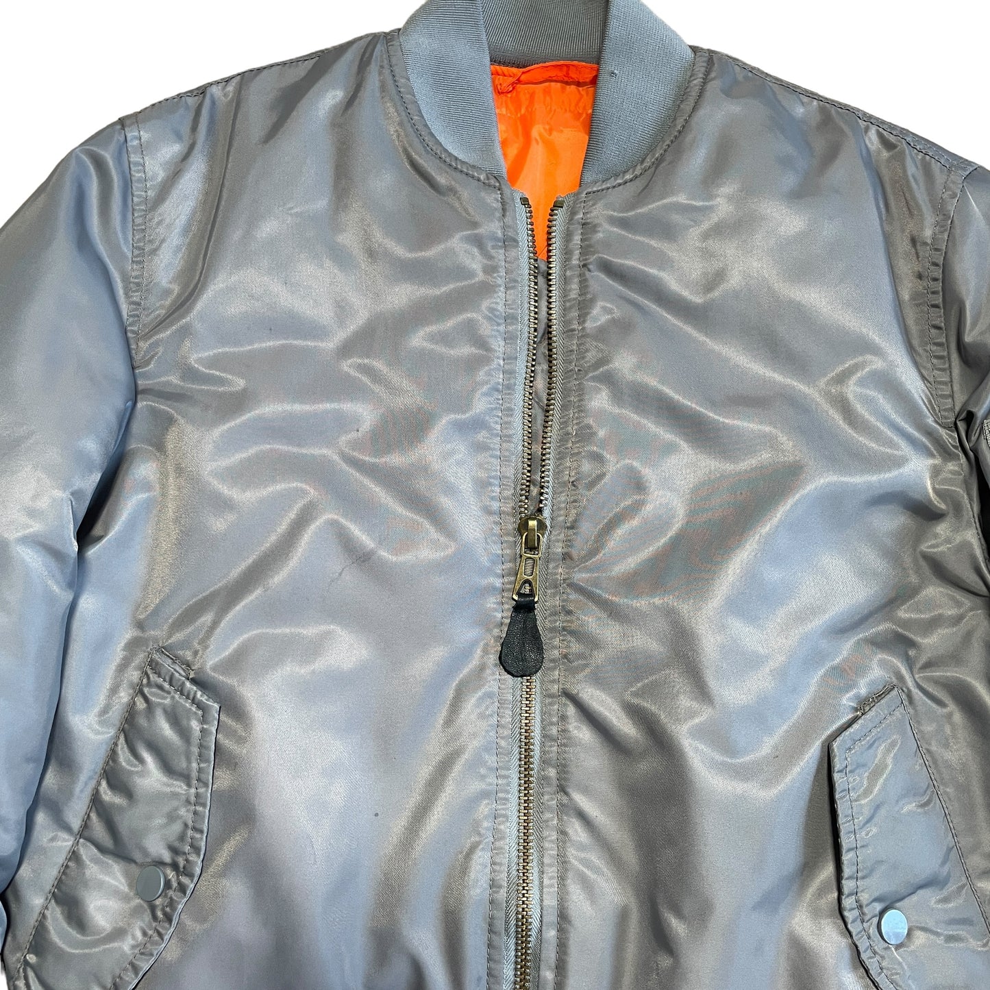 Repaired Military MA-1 Style Jacket Silver Nylon Reversible Orange lining [0012]